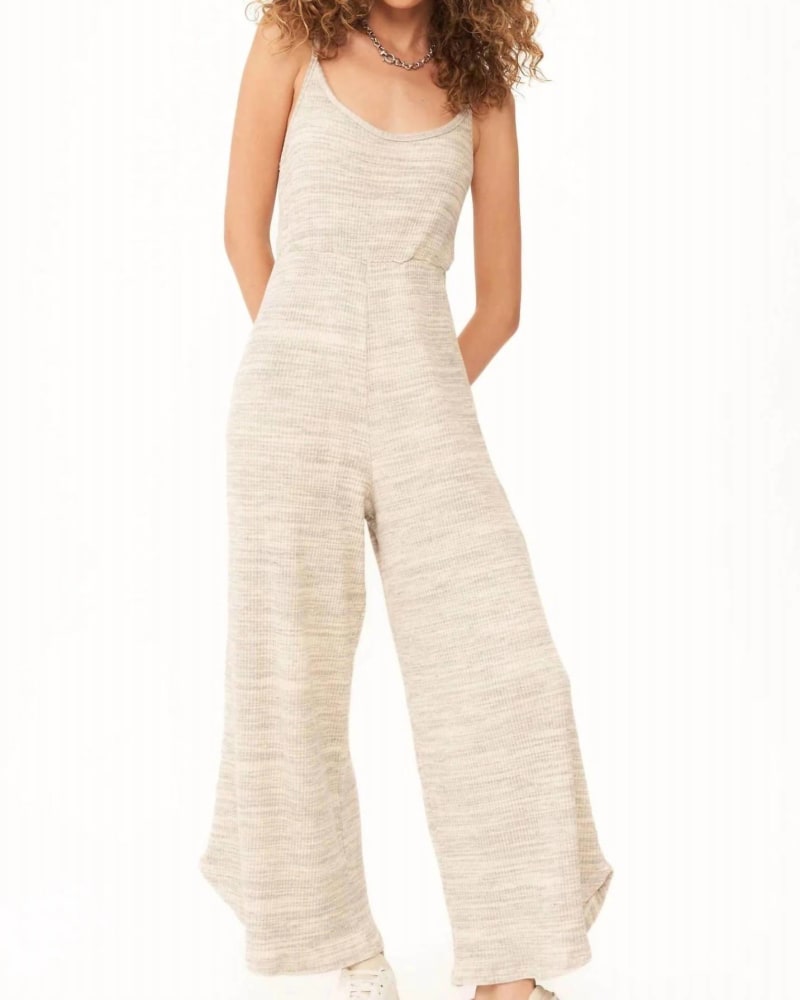 Front of a model wearing a size lrg Last Dance Twist Back Sweater Rib Jumpsuit In Oat in Oat by PROJECT SOCIAL T. | dia_product_style_image_id:359459